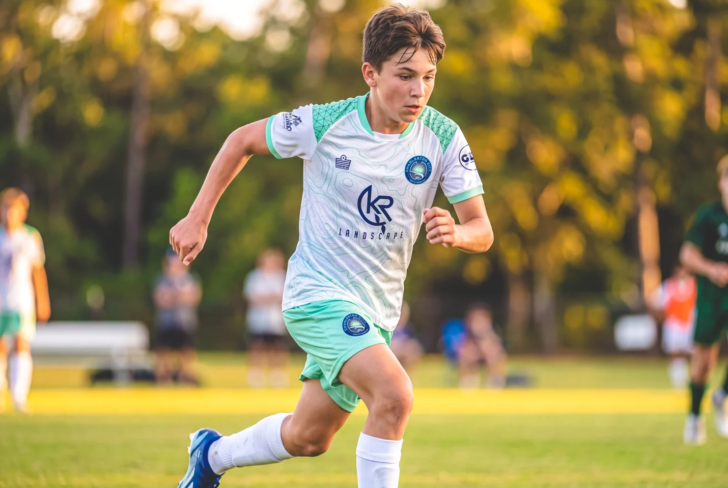 Charleston City FC player wearing the white and teal home kit